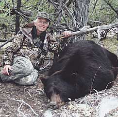 Donald Wenner with New Mexico's #6 black bear, taken in Catron County in 2005. (Photograph courtesy of the Boone and Crockett Club.)
